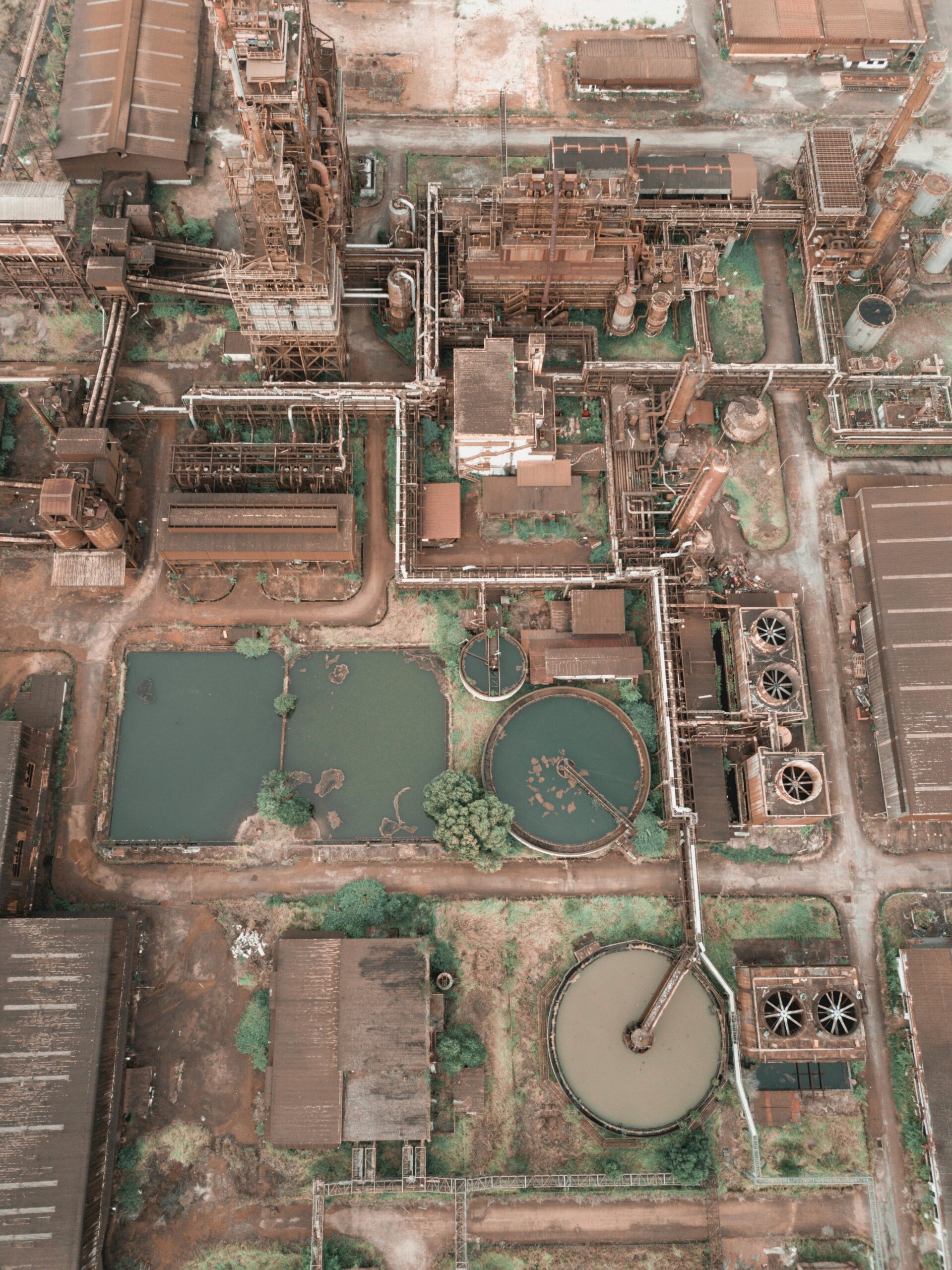 Aerial shot of a large wastewater treatment plant with a focus on environmental sustainability in Malaysia.